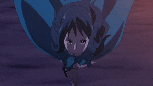 a close up of a cartoon character 's eyes with a dark background