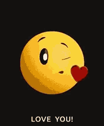 a smiley face is blowing a kiss with a red heart on its nose .