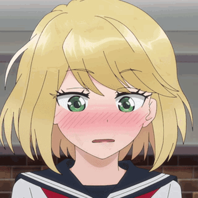 a girl with blonde hair and green eyes is making a surprised face