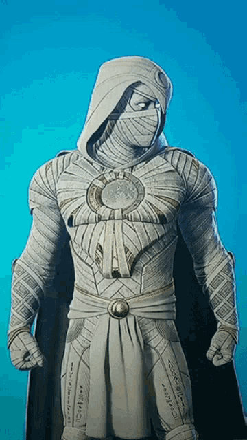 a man in a white costume with a hood and a black cape