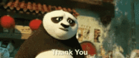 a panda bear is saying thank you in front of a building