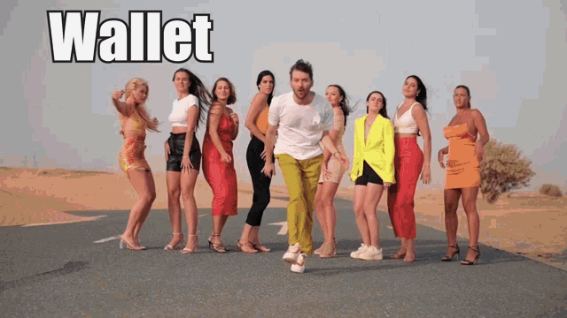 a group of women are standing next to a man on a road with the word wallet written above them