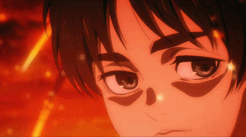 a close up of a person 's face with fire behind him