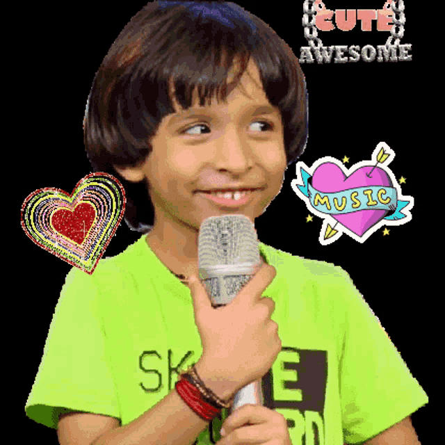 a young boy in a green shirt holds a microphone