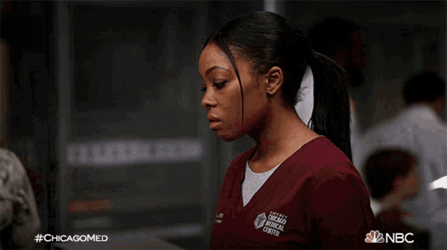 a woman in a chicago medical center scrub top