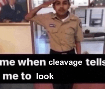 a man in a military uniform is saluting in front of a picture of a man in a suit and tie .