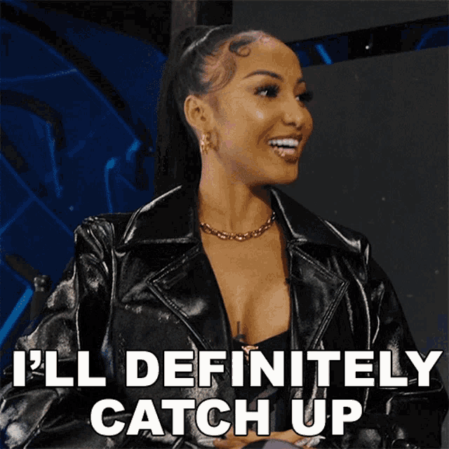 a woman in a black leather jacket is smiling and says " i 'll definitely catch up "