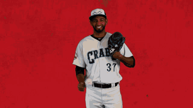 a baseball player wearing a jersey that says crab 37