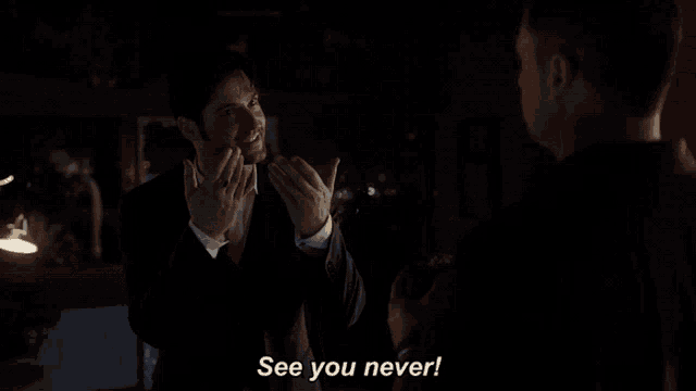 a man in a suit talks to another man and says " see you never "