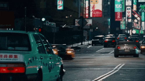 a busy city street with a sign that says karaoke