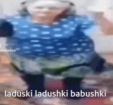a blurry picture of a person with the words " laduski laduski babushki " on the bottom right