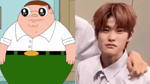 a cartoon character with big eyes is next to a man in a white shirt .