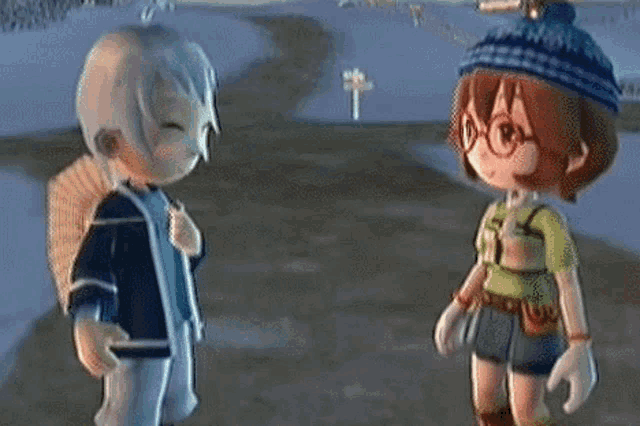 a boy and a girl are standing next to each other in a game .