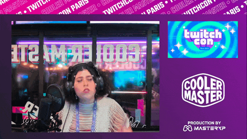 a woman wearing headphones stands in front of a microphone in front of a sign that says twitch con