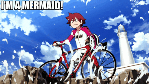 a person riding a bike with the words i 'm a mermaid