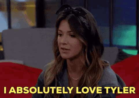 a woman says i absolutely love tyler while sitting on a couch