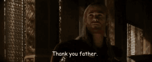 a man with long hair and a beard is saying " thank you father "