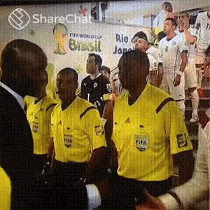 a group of soccer players are standing in front of a sign that says brasil