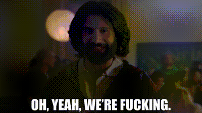 a man with a beard is wearing a hat and says `` oh yeah , we 're fucking . ''