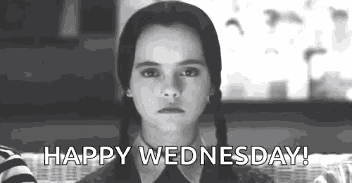 a black and white photo of a girl with pigtails saying happy wednesday .