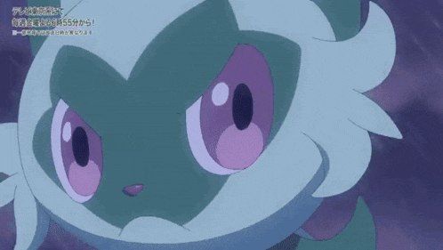 a cartoon character with purple eyes and a green mask
