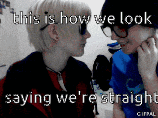 a couple looking at each other with the words " this is how we look saying we 're straight " on the bottom