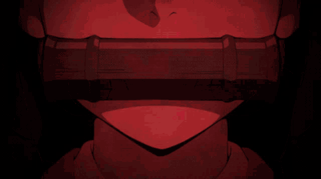 a close up of a person 's red eyes with a black background
