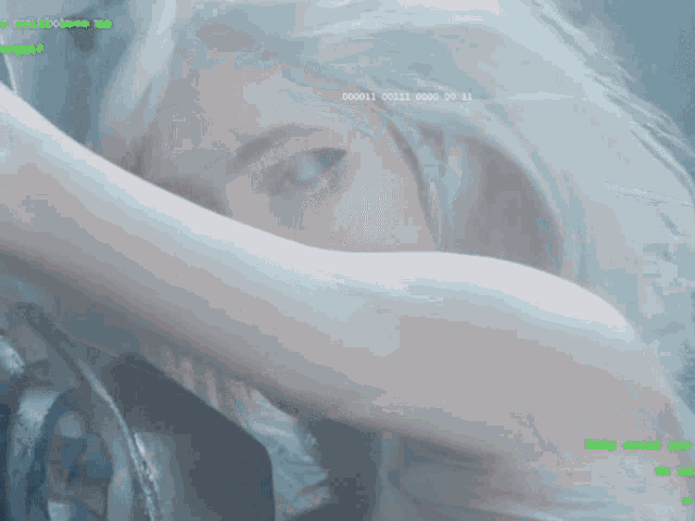 a computer screen shows a woman with white hair and the words baby would you on the bottom right