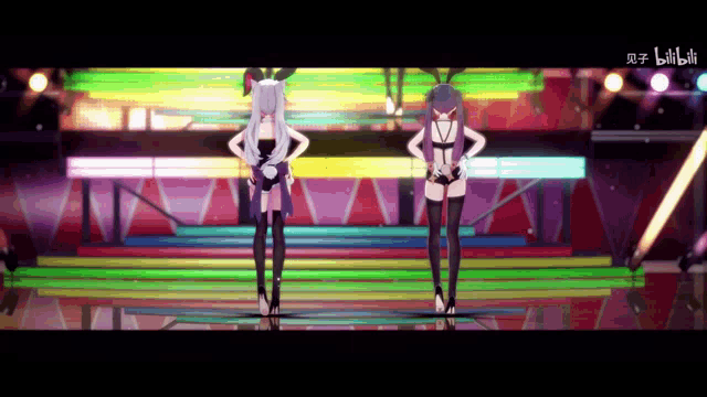 two anime girls are dancing on a stage with chinese characters on the bottom right