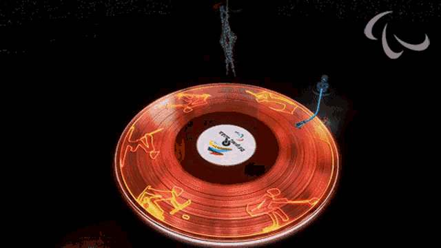 a record with the word paralympics on the label