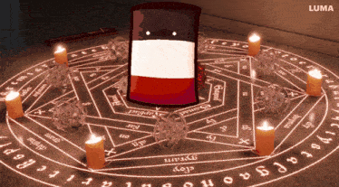 a circle of candles with the word luma at the top