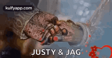 a bride and groom are holding hands on their wedding day and the bride is wearing a ring on her finger .