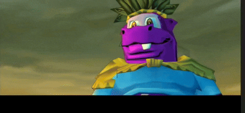 a purple cartoon character is wearing a blue shirt and a yellow cape