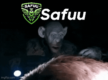 a monkey is looking at a person 's head in the dark .