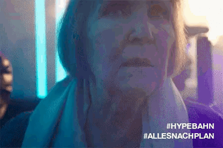 an animated image of an elderly woman with #hypebahn #allesnachplan on the bottom