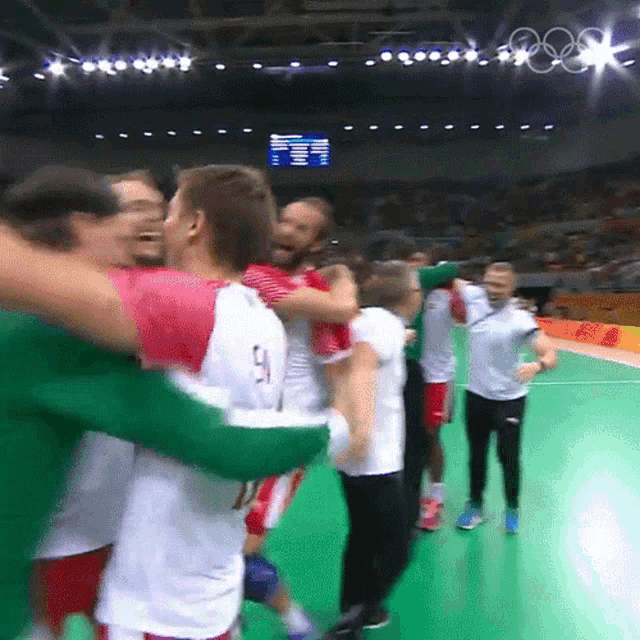 Hug Olympics GIF - Hug Olympics Celebrate GIFs