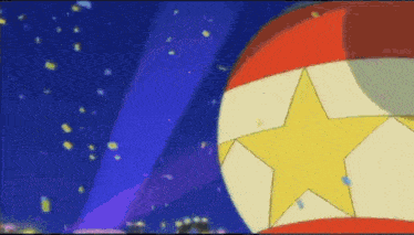 a red , white , and yellow ball with a star on it