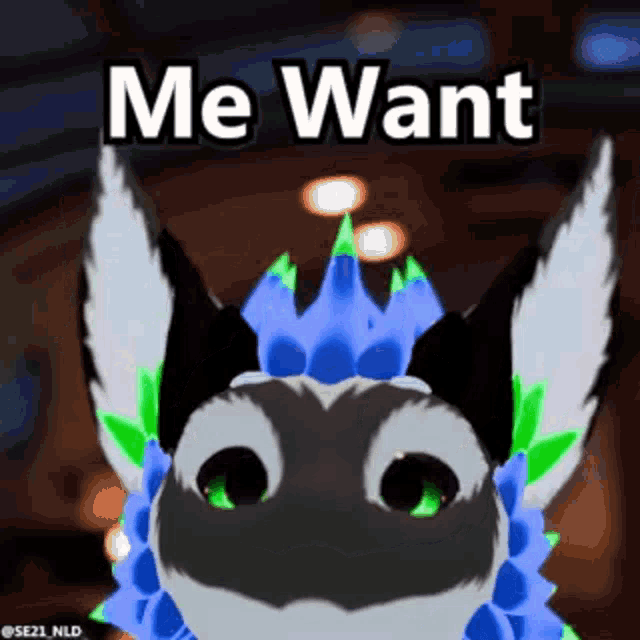 a furry animal with a crown on its head and the words `` me want '' above it .