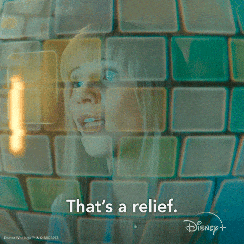 a woman behind a glass wall with the words that 's a relief