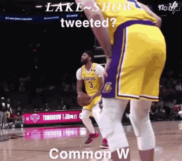 a basketball player with the number 3 on his jersey stands on the court