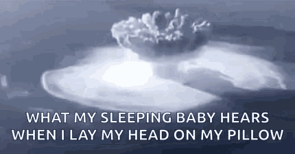 a picture of a nuclear explosion with the words `` what my sleeping baby hears when i lay my head on my pillow ''