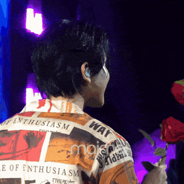 a man in a shirt that says e of enthusiasm