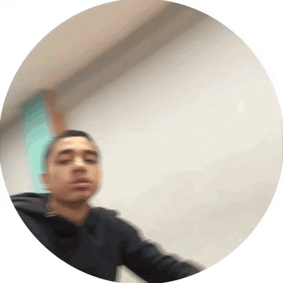 a blurry picture of a man in a black hoodie