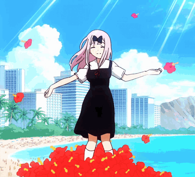 a girl in a black dress is standing in a pile of flowers