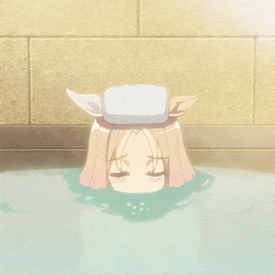 a soap bar is floating in a bathtub with petals coming out of it