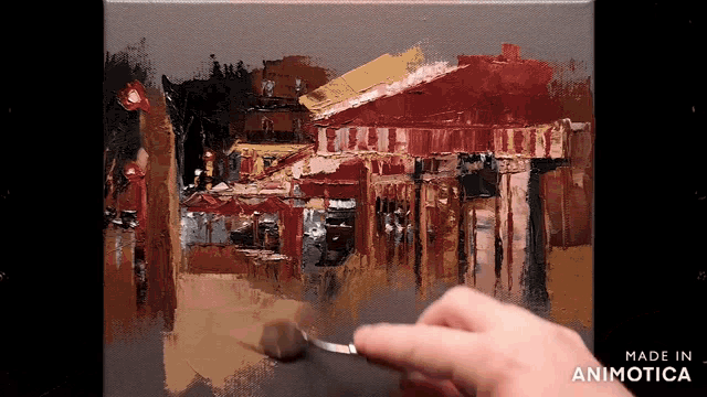 a painting is being painted on a canvas and the words made in animotica are visible