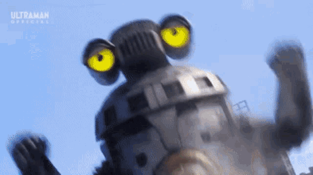 a cartoon character with yellow eyes is standing in the air .