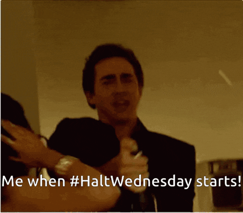a picture of a man holding a lighter with the caption " me when #halt wednesday starts "