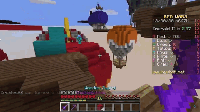 a screenshot of a minecraft game with a hooden sword on the screen