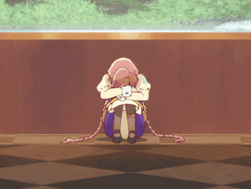 a cartoon character is laying on the floor